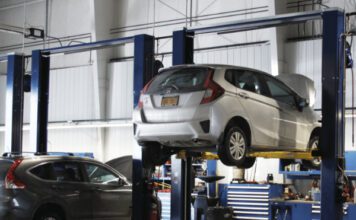 Two-post automotive lifts
