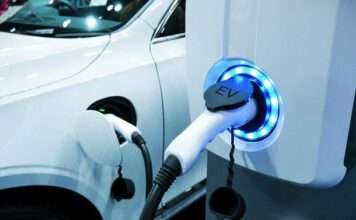 Nearly Half of Americans Plan to Buy EVs by 2030, Survey Finds EV being charged